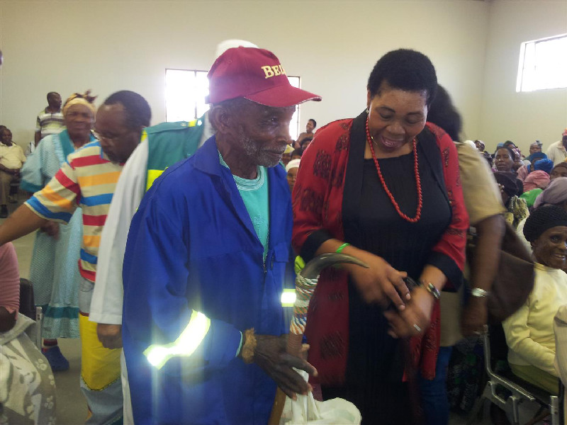 Mr Cojule Dube, the 94 year old husband of Novana Dube goes to take his place at her side